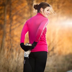Young woman stretching before her run outdoors on a cold fall/winter morning, Source: Photodune.net