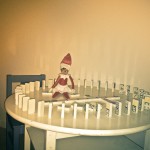 Elf on the Shelf: Playing with Dominos, 2012 Copyright Will Hull, Windy Pinwheel