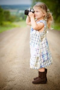 Little Girl Photographer, Source: Pixabay taking great action shots of kids